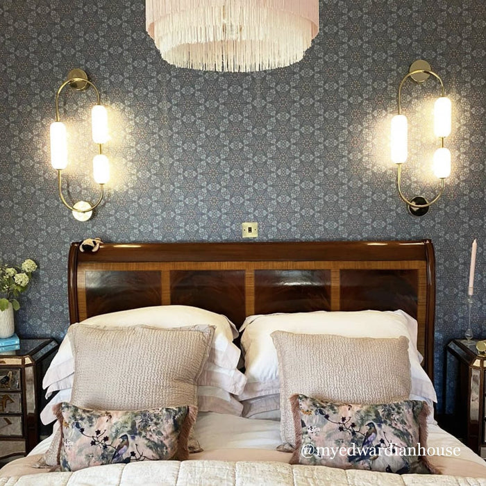 Wild Lone's "Greenhouse" wallpaper in "Ornamental Blue" in a romantic bedroom in an Edwardian house (photo @myedwardianhouse).