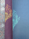 Closeups of segments of the fantastical bee motifs in Wild Lone's "Night Flight" wallpaper, in both the "Electric Blue" and "Purple Jewel" colourways.